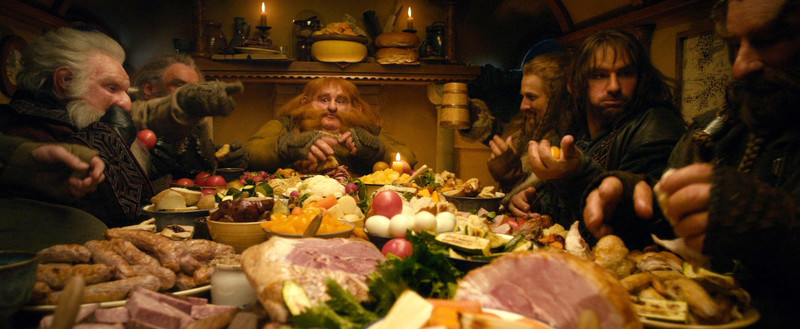 The Dwarves in The Hobbit having dinner in Bag End